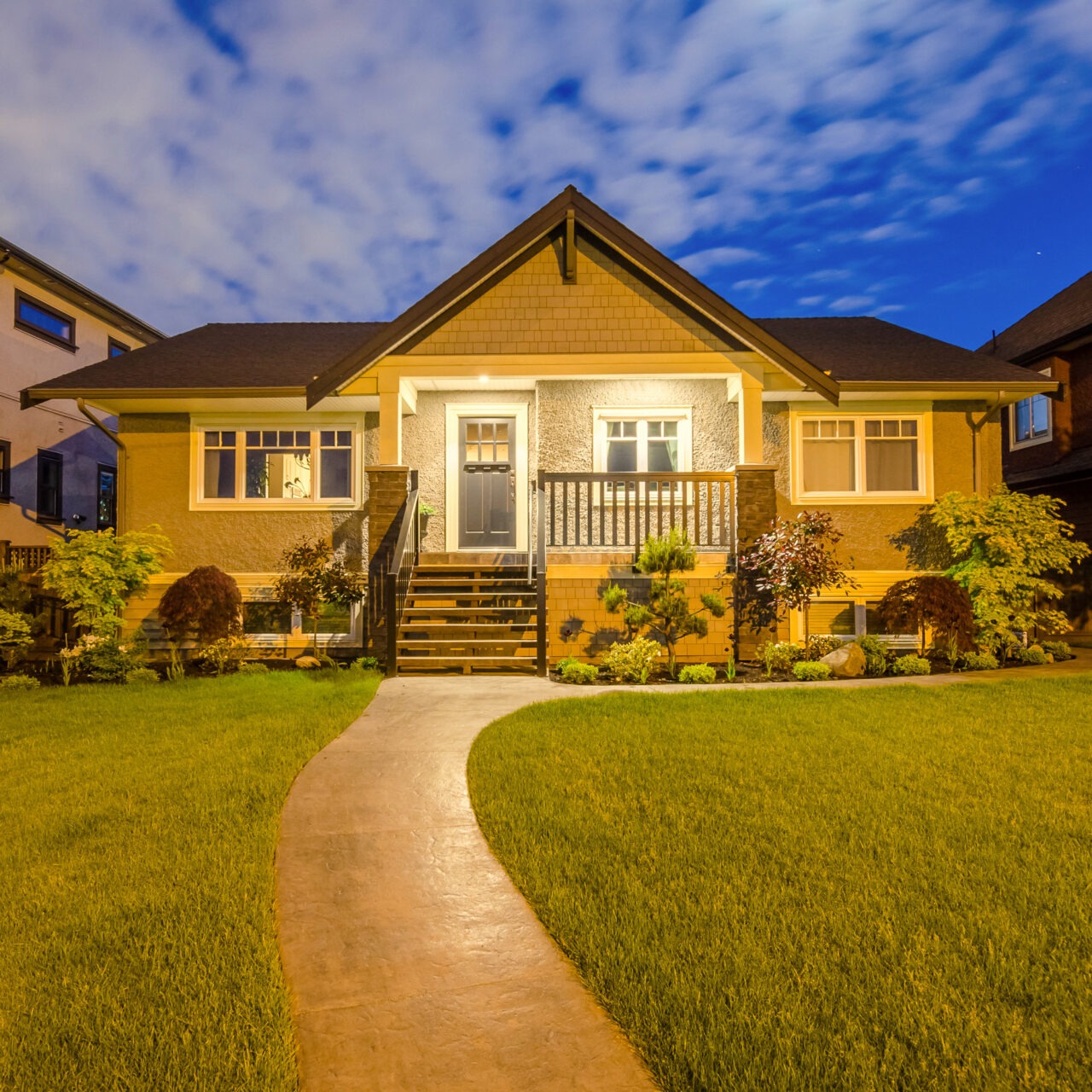 Home at Dusk with Exterior Lights On